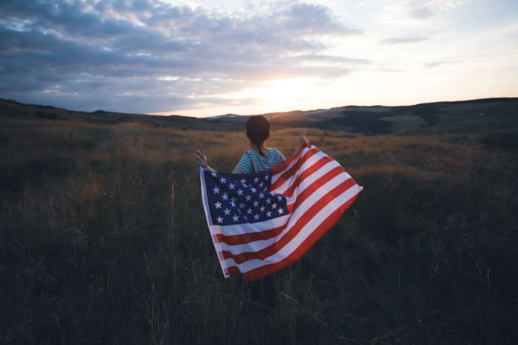 Woman with USA flag.